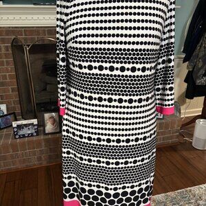 The Laura Jeffries dress features a stylish polka dot pattern in a vibrant multi